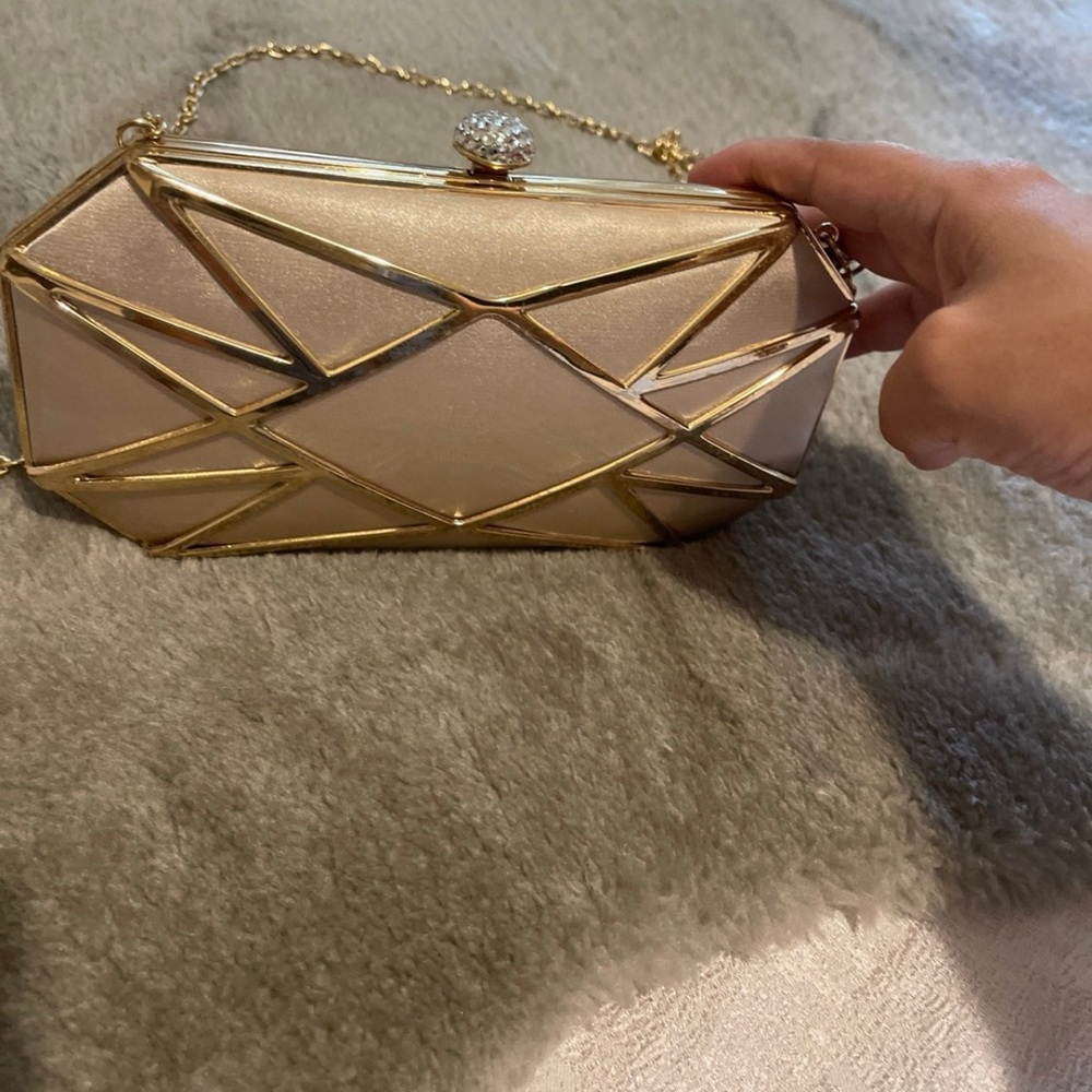 Elegant Gold and Cream Geometric Clutch